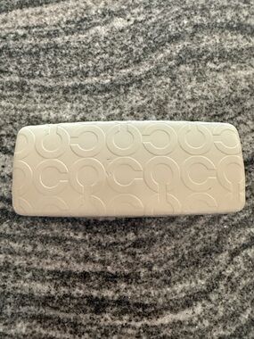 Coach embossed cream eyeglass case